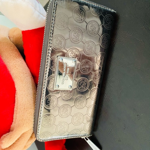 Michael Kors Handbags - Metallic Silver Michael Kors Wallet